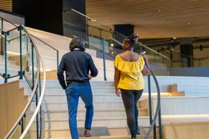 The Ally Co. brand photo containing stairs,talking