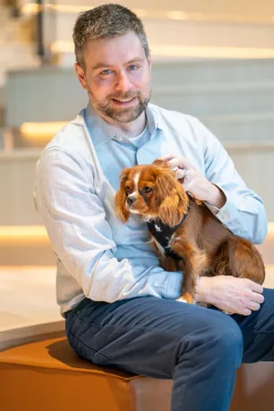 The Ally Co. brand photo containing dog,smiling,happy